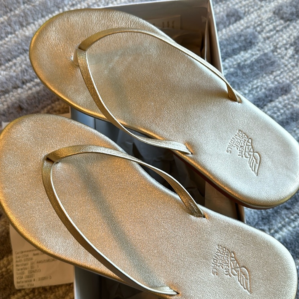 Platinum Flip Flops with comfortable padded footbed.